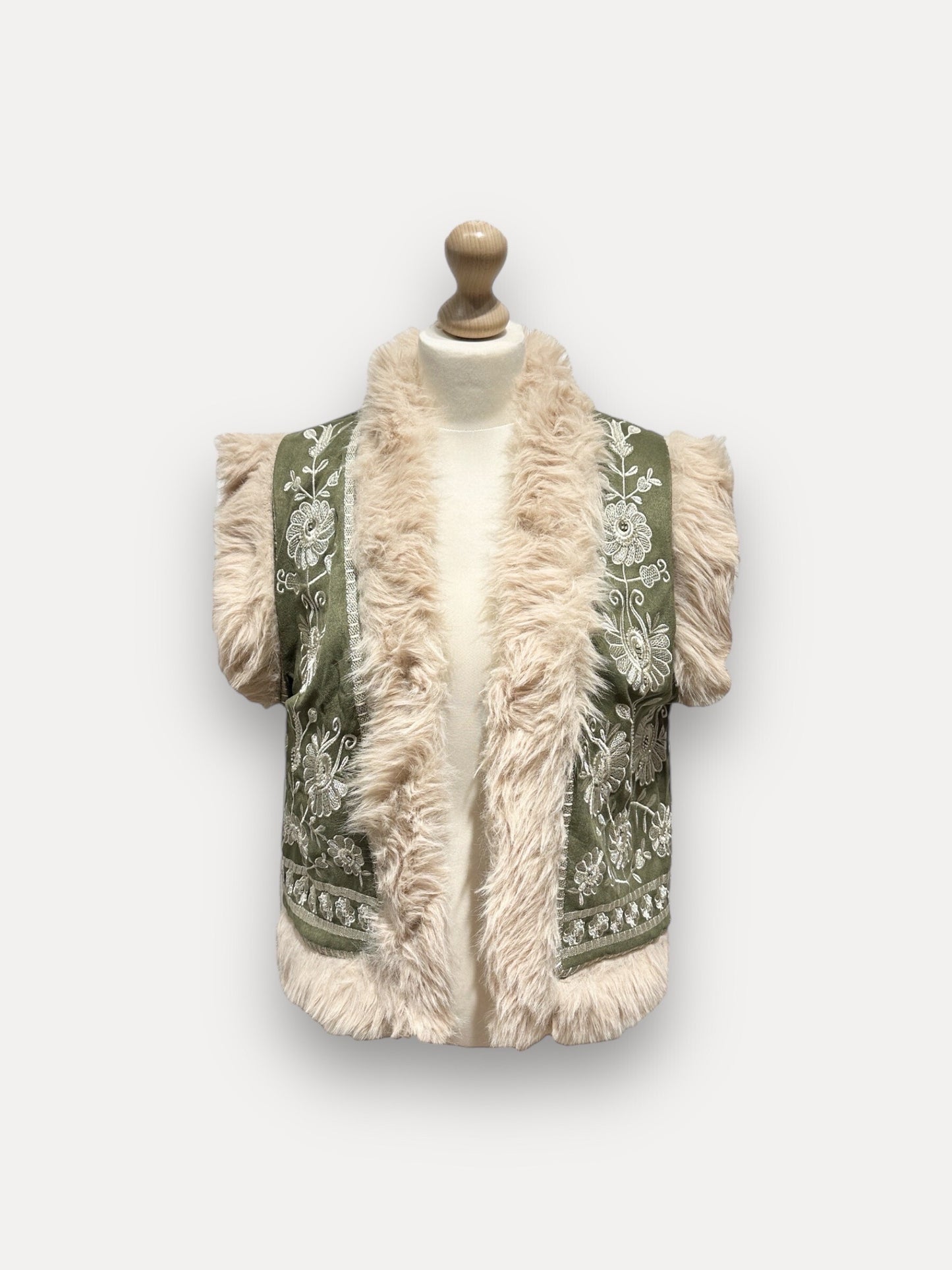 Gilet ouvert en fourrure sans manches avec broderie florale